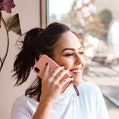 Woman talking on phone and smiling